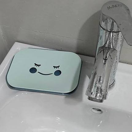 Lot de 2 porte-savon souriants en bleu et rose - E-menage