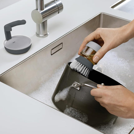 Brosse à vaisselle avec distributeur de Liquide
