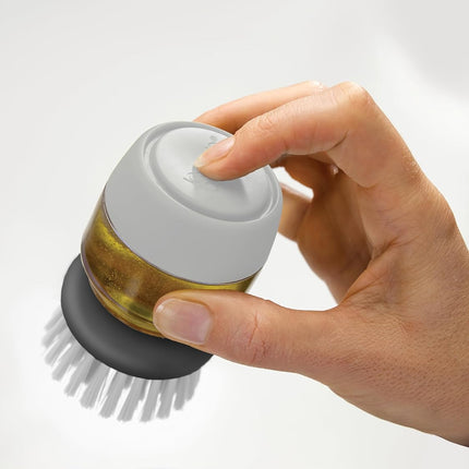 Brosse à vaisselle avec distributeur de Liquide