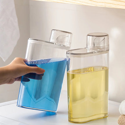 Bouteille distributrice de lessive transparente avec réservoir fermé